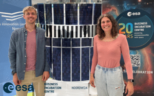 space business professionals by the satellite at ESA BIC Noordwijk