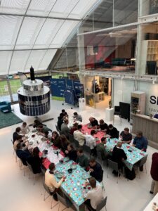 entrepreneurs lunching in the atrium by the satellite at SBIC Noordwijk