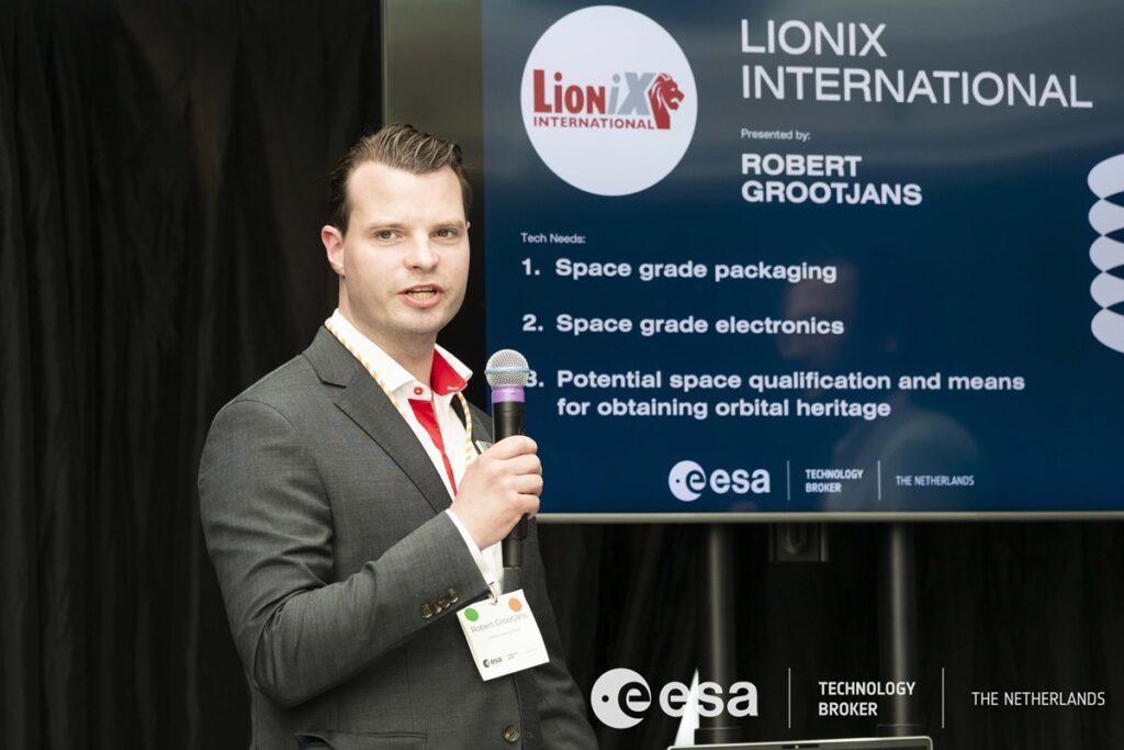 space business professional presenting on stage