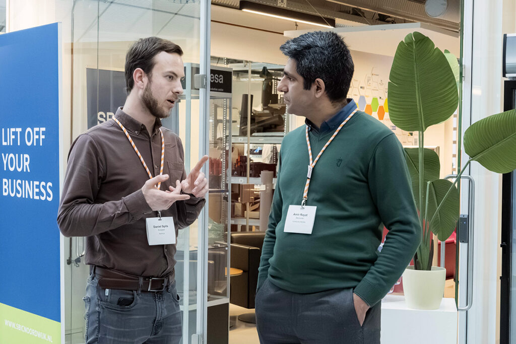 space business professionals in the atrium at SBIC Noordwijk