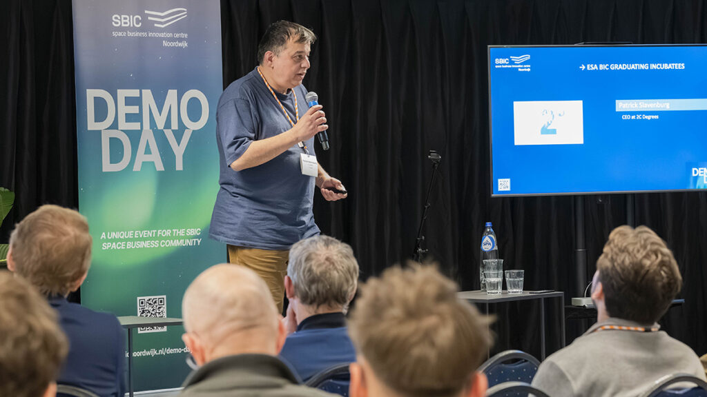 space business professional on stage at SBIC Noordwijk