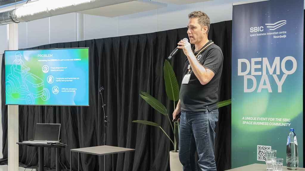 space business professional on stage at SBIC Noordwijk