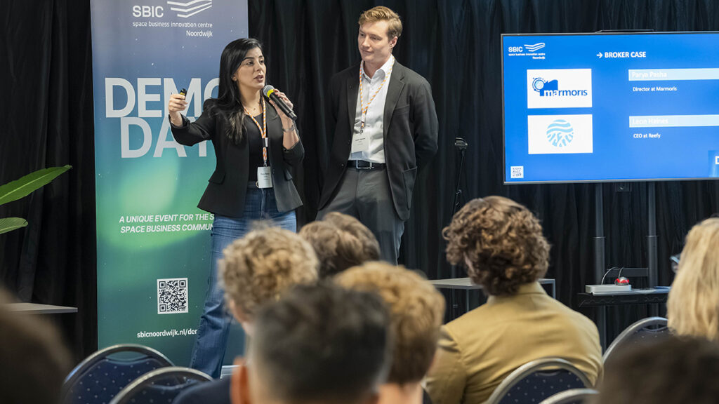 space business professional on stage at SBIC Noordwijk