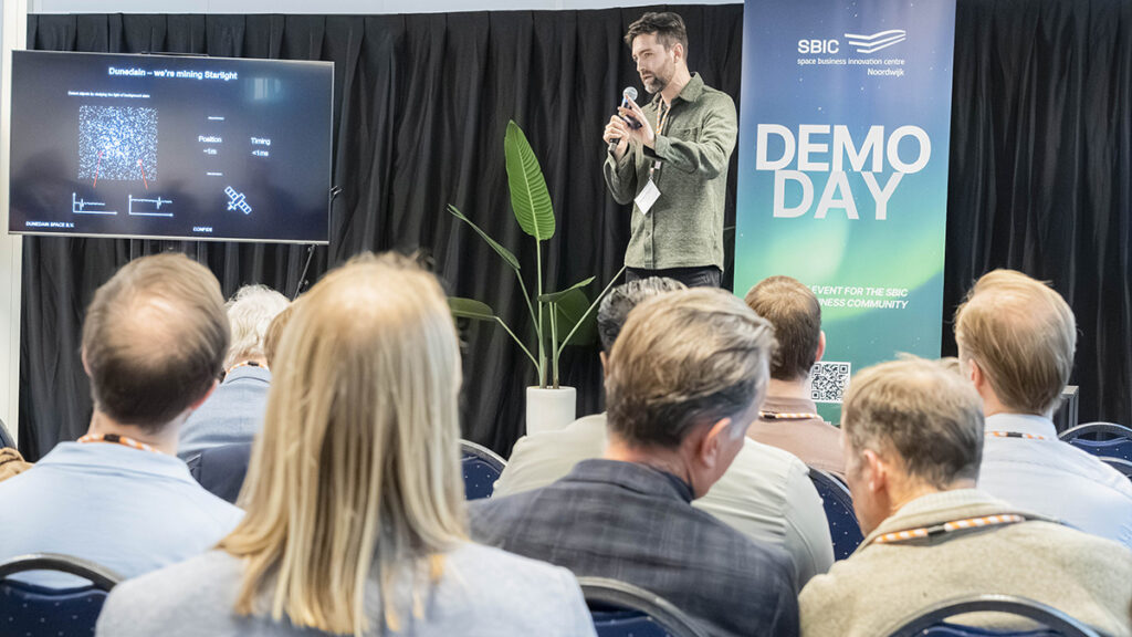 space business professional on stage at SBIC Noordwijk