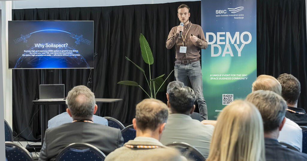 space business professional on stage at SBIC Noordwijk