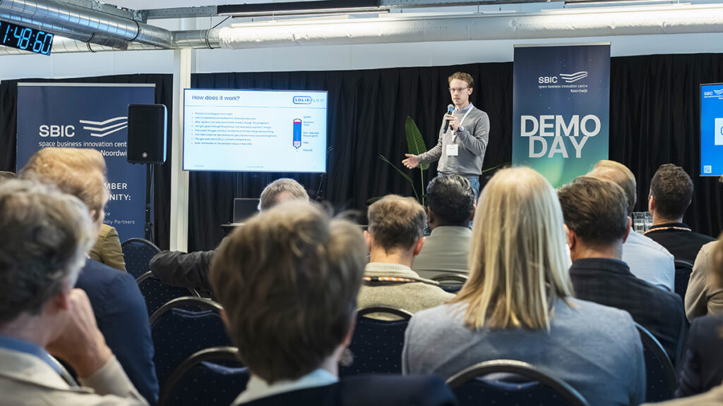 space business professional on stage at SBIC Noordwijk