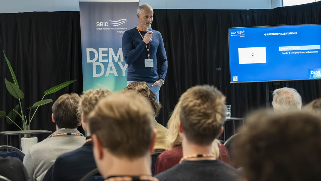 space business professional on stage at SBIC Noordwijk