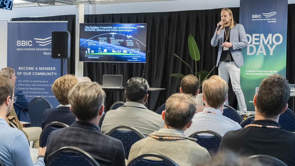 space business professional on stage at SBIC Noordwijk