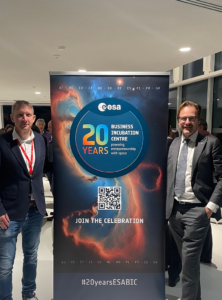 space business professionals by the ESA BIC 20 years banner at Paris HQ of the European Space Agency