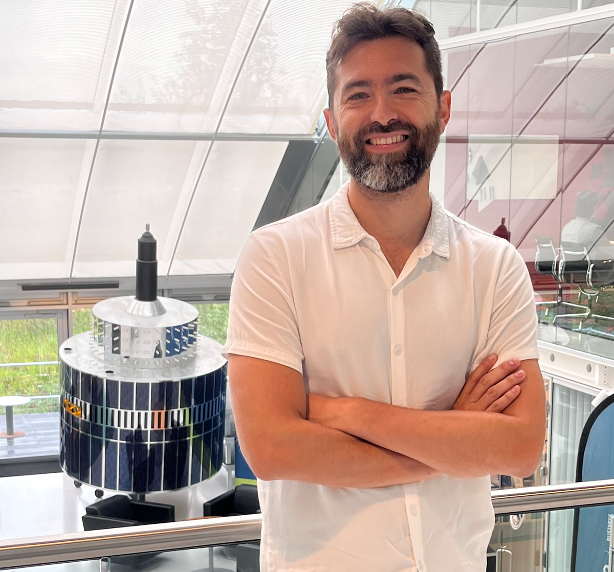 space business professional with the satellite at SBIC Noordwijk in background
