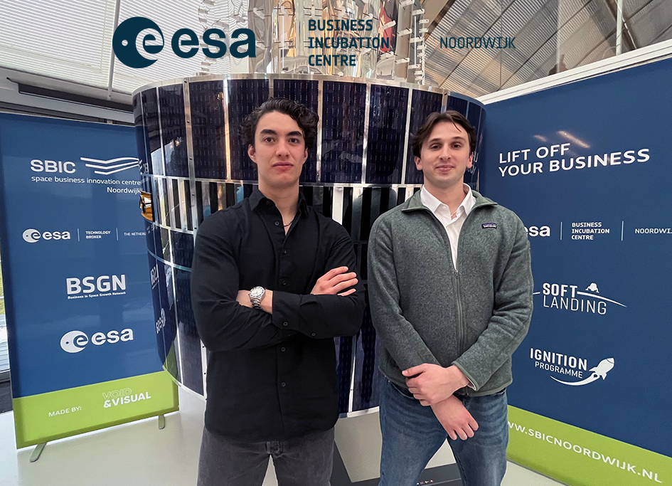 space business professionals by the satellite at ESA BIC Noordwijk