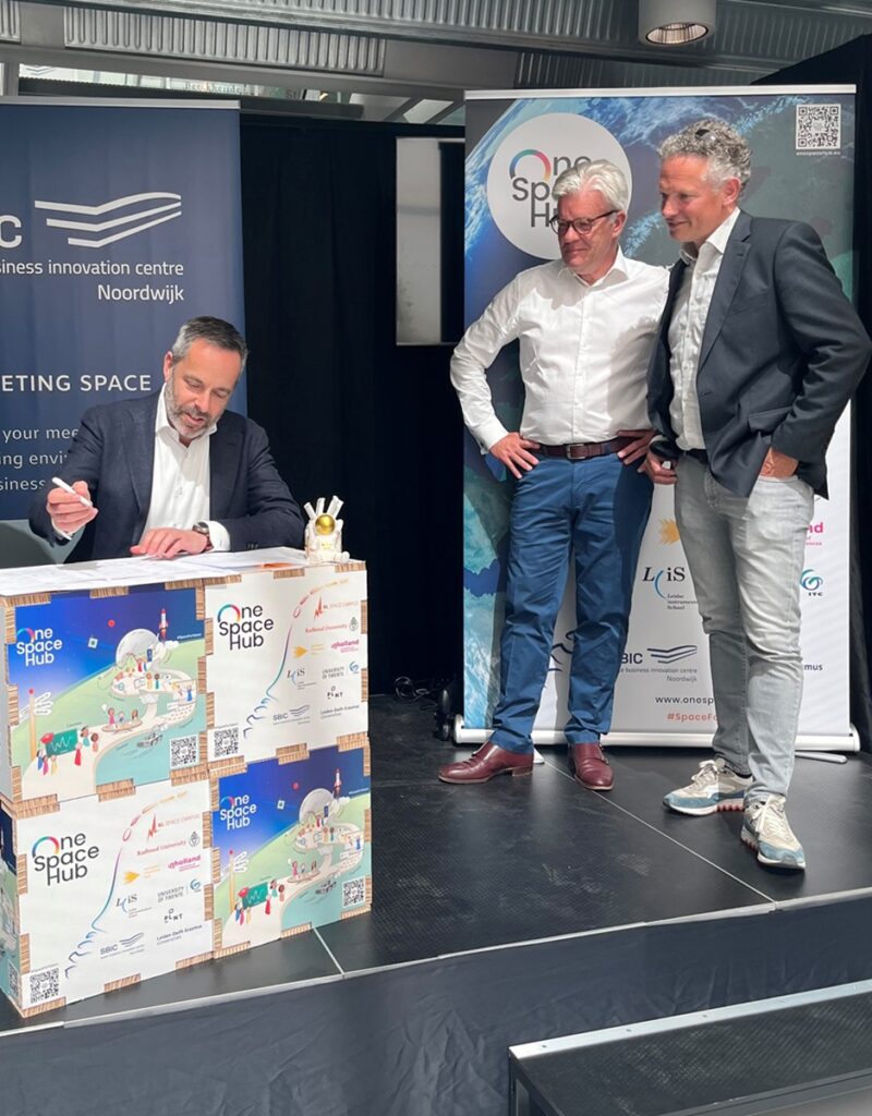 space business professionals on stage at SBIC Noordwijk