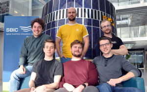 ESA BIC startup Revolv Space team by the satellite at SBIC HQ