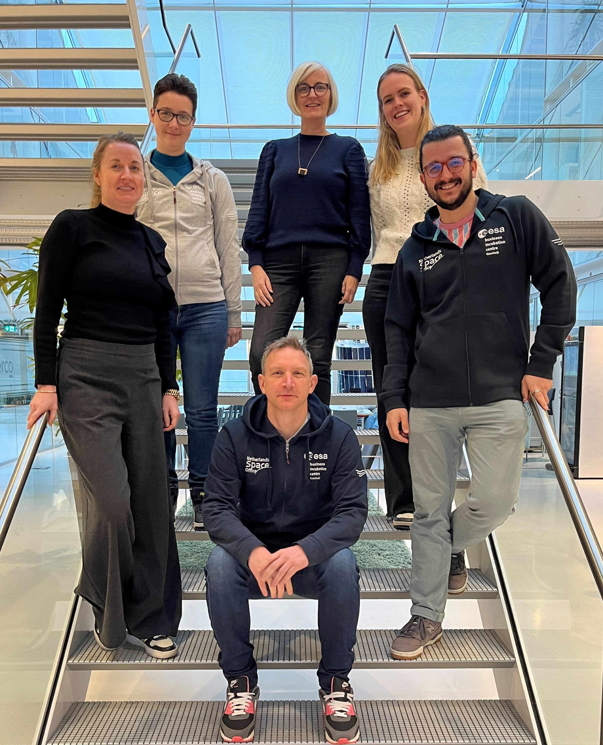 The SBIC team's office is to the right of these stairs as you enter the building; pop by to say hi! SBIC team members on the stairs in the atrium at SBIC Noordwijk