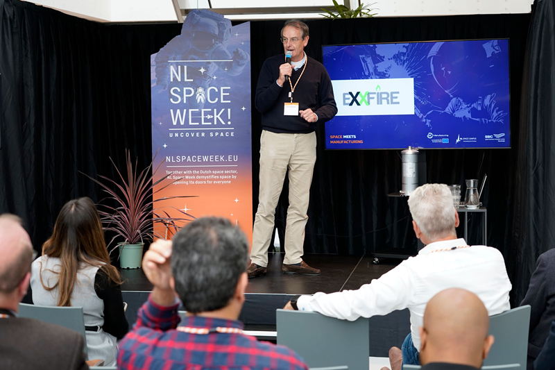 space business professional on stage at SBIC Noordwijk