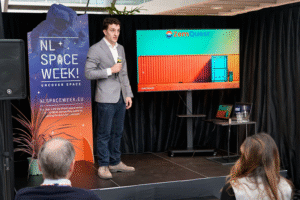 space business professional on stage at SBIC Noordwijk