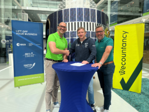 business professionals by the satellite at Space Business Innovation Centre Noordwijk