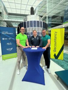 business professionals by the satellite at Space Business Innovation Centre Noordwijk