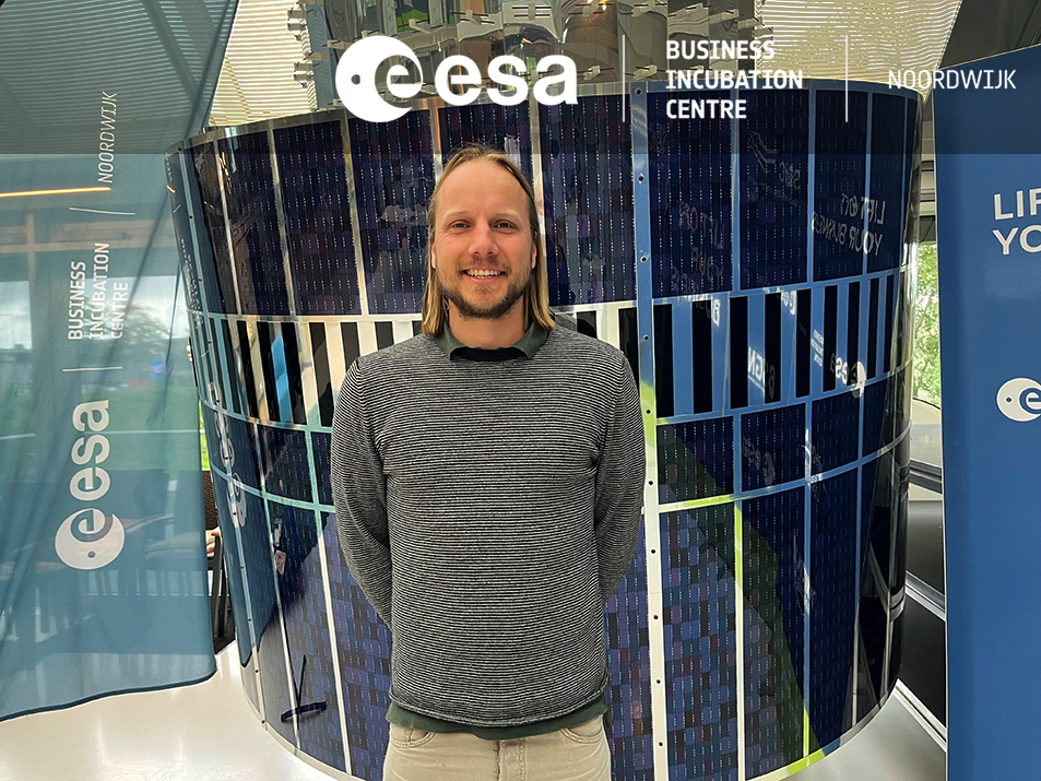 space business professional by the satellite at ESA BIC Noordwijk